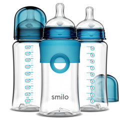 Smilo baby bottle front view with stage 0 anti-colic nipple in aqua blue for gentle newborn feeding