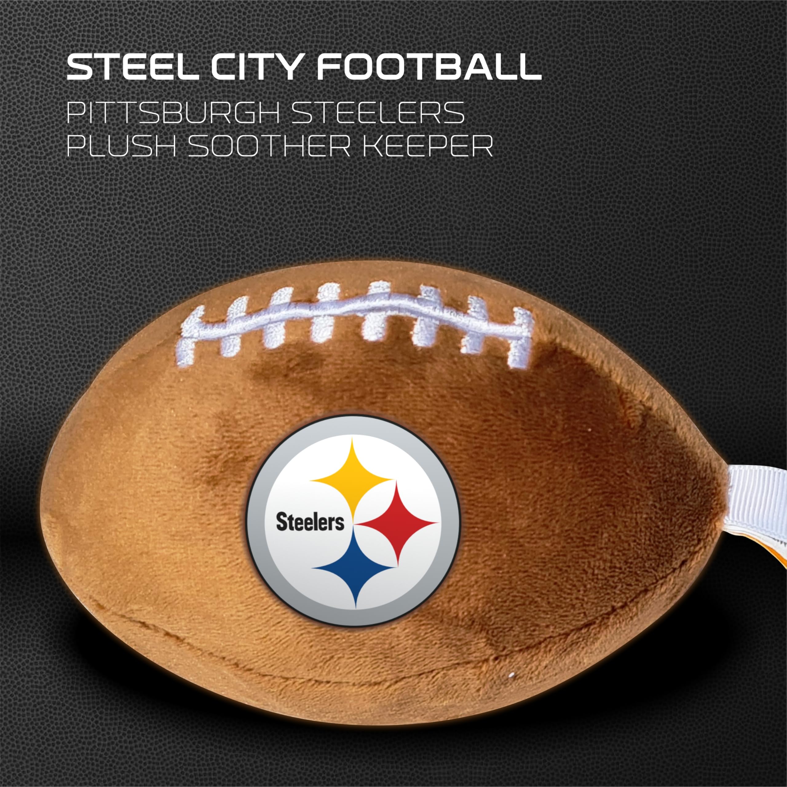 Smilo plush football pacifier holder attached to stroller during outings