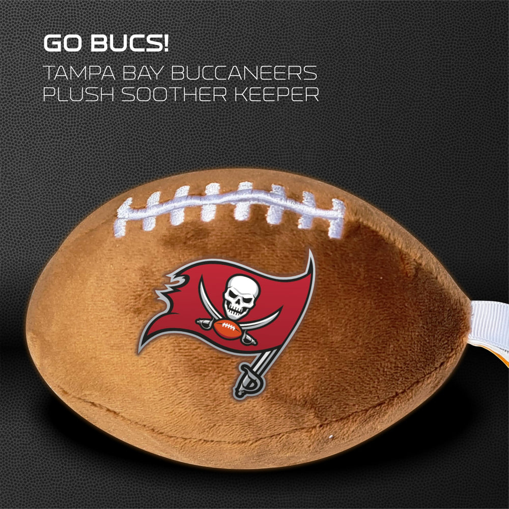 Smilo plush football companion in hand illustrating comforting use for baby