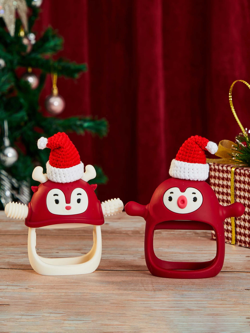 Smily Mia teething mittens on a baby hand showing secure grip