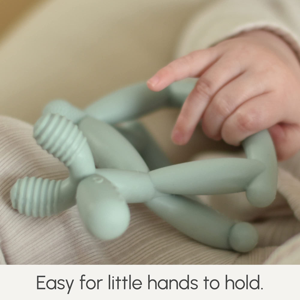 Smooch rocking teether blue hue provides soothing visuals and can pair with nursery decor
