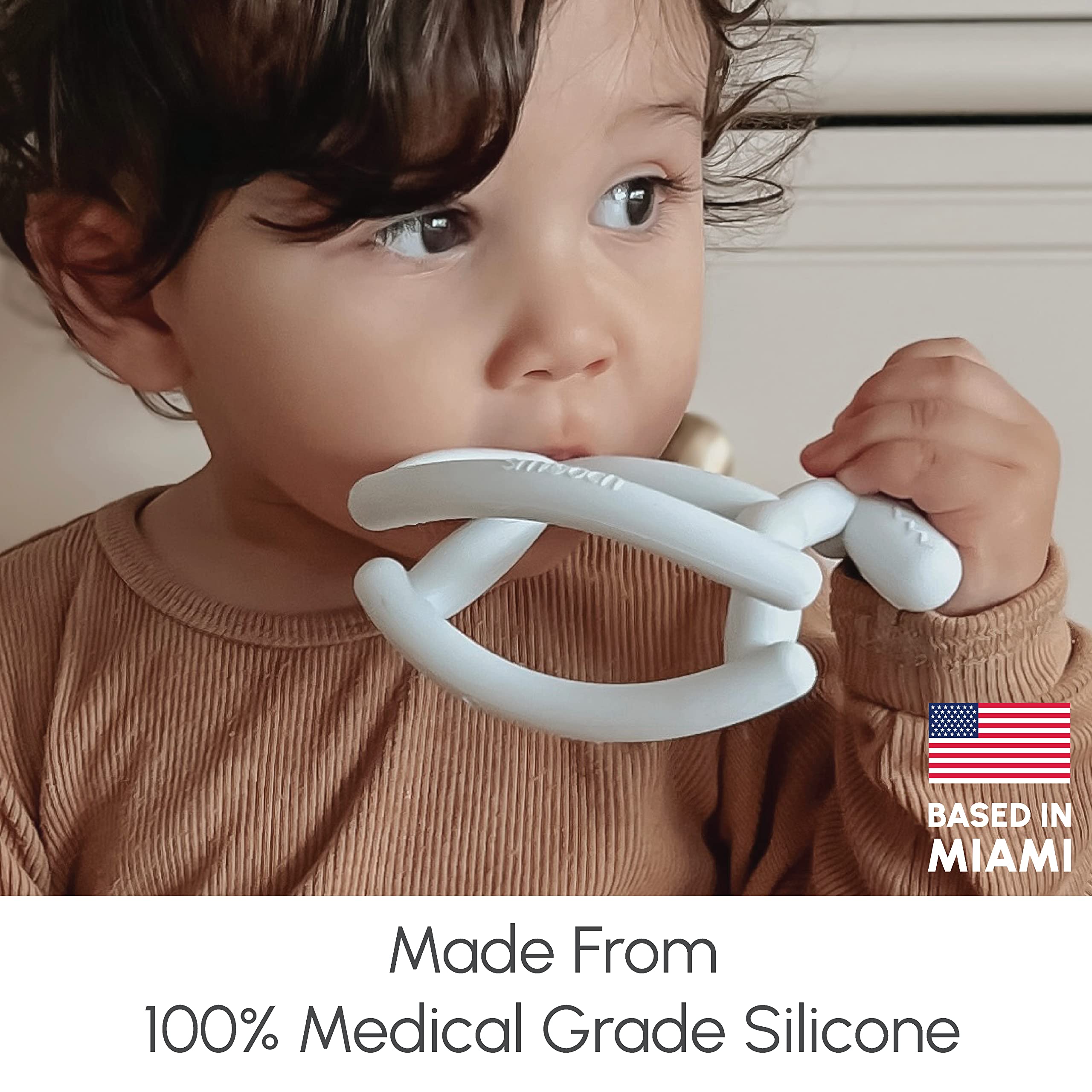 Smooch rocking teether easy grip promotes tiny hands secure hold for little chewers