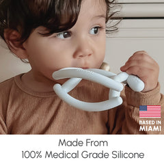 Smooch rocking teether easy grip promotes tiny hands secure hold for little chewers