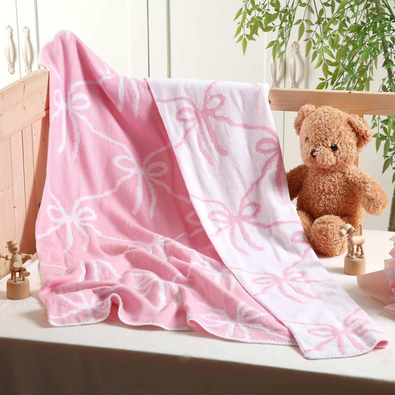 SmoothNovelty Pink Bow Knit Swaddle Blanket knit detail close-up showing gentle stretch