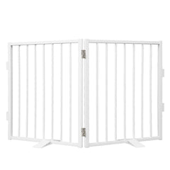 Snagle Paw full metal dog gate in white blocks doorways for pet containment.