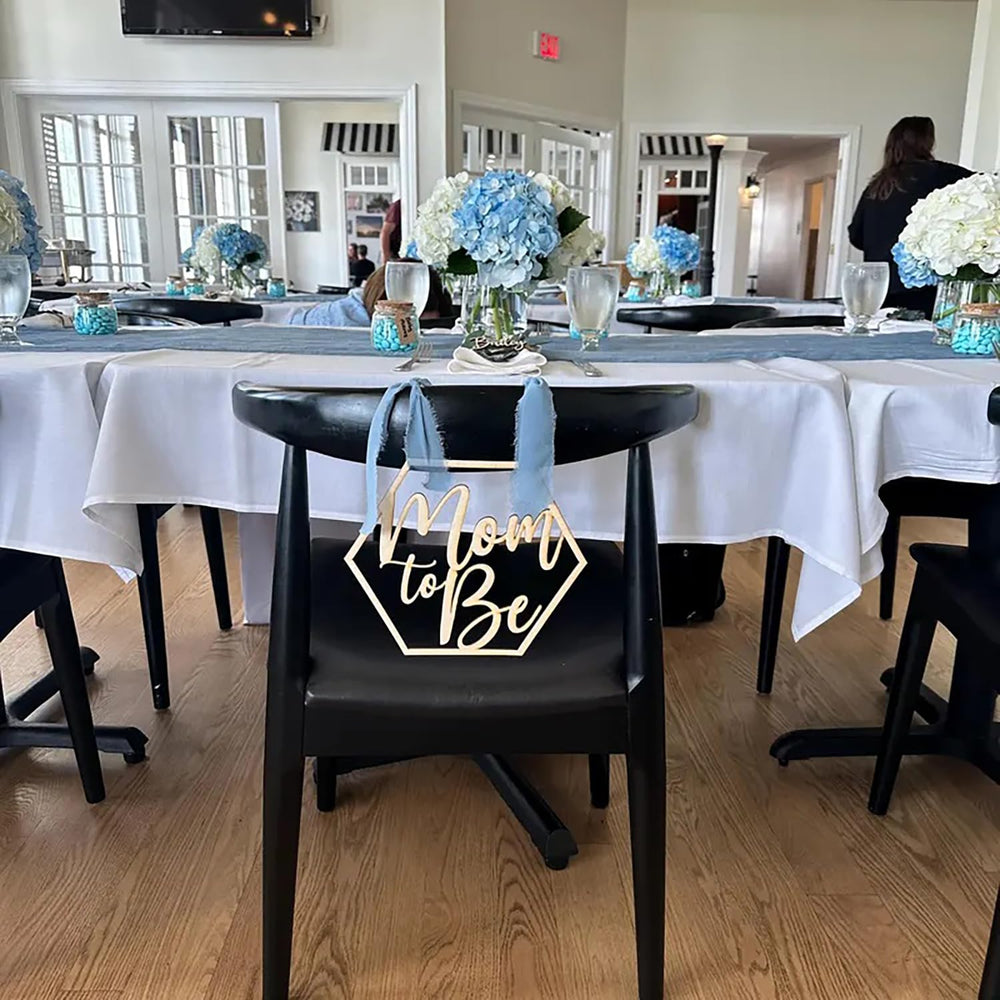 Snlioek mom-to-be chair sign on-chair view highlights the seating focal point.