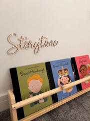 Snlioek Storytime Sign in nursery reading nook with warm wood finish
