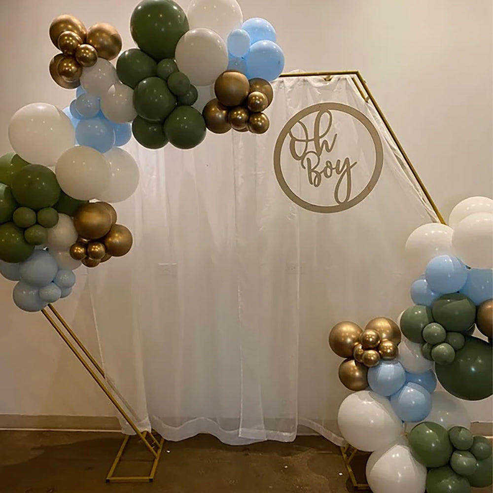 Snlioek gender reveal sign Oh Boy decor pairs with balloons and cake toppers.