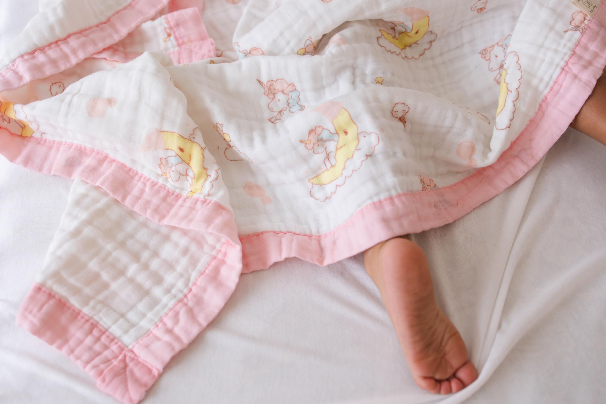 Snuggle Buds machine-washable muslin blanket stays soft wash after wash.