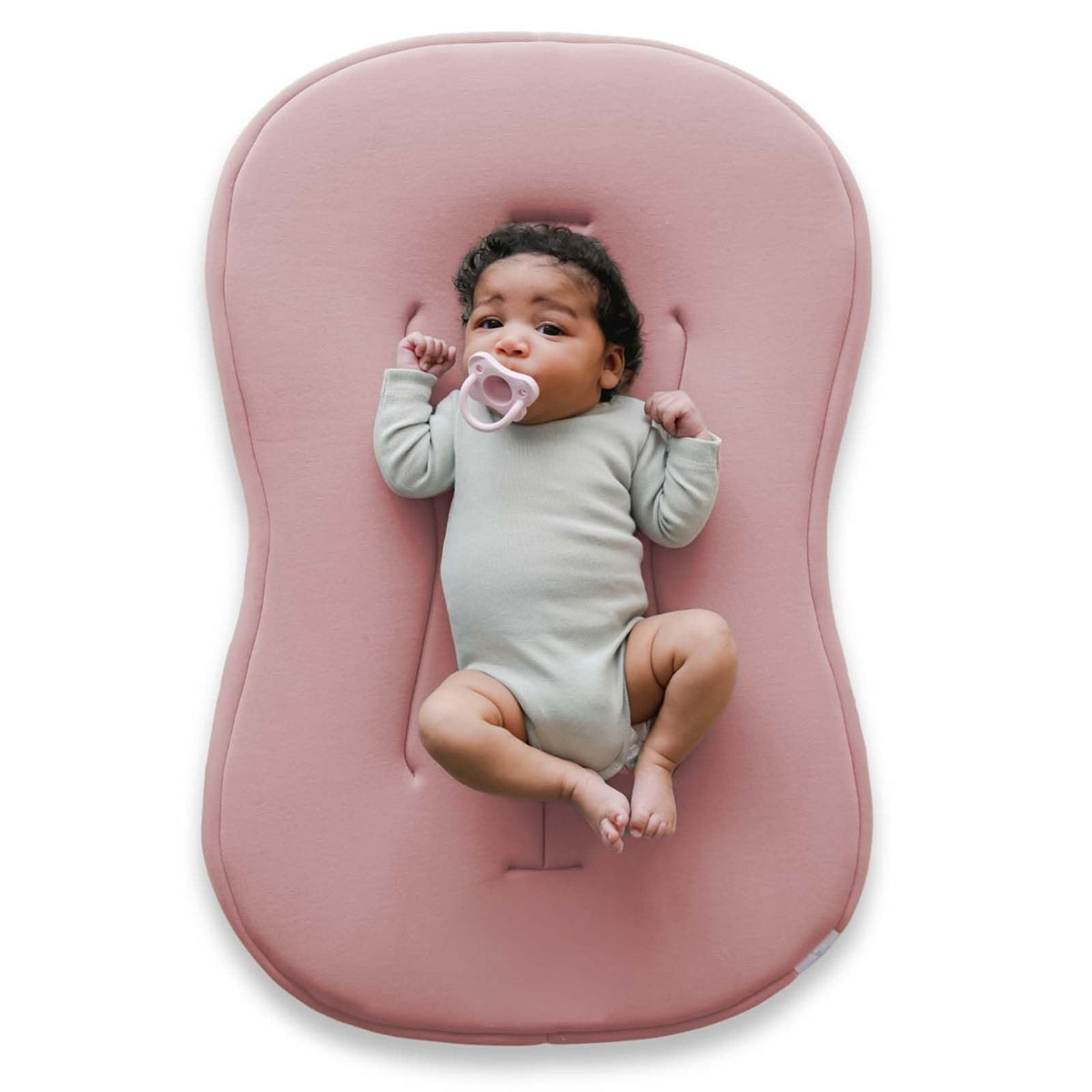 Snuggle Me Baby Lounger Curve cover close-up in buttery-soft organic cotton for newborn comfort.