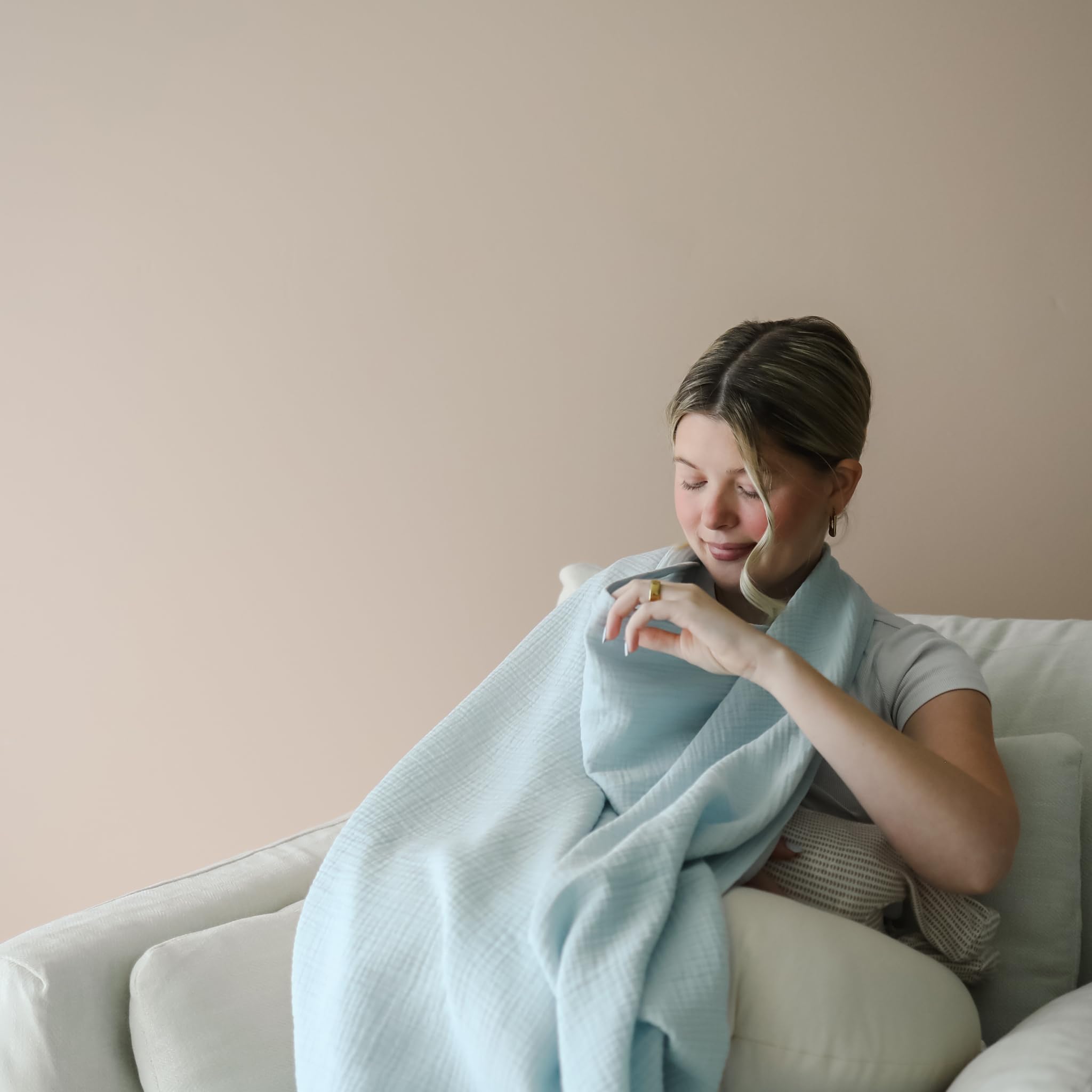 snuggle me cover used as burp cloth or quick cover-up for busy days