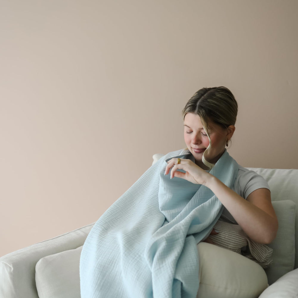 snuggle me cover used as burp cloth or quick cover-up for busy days