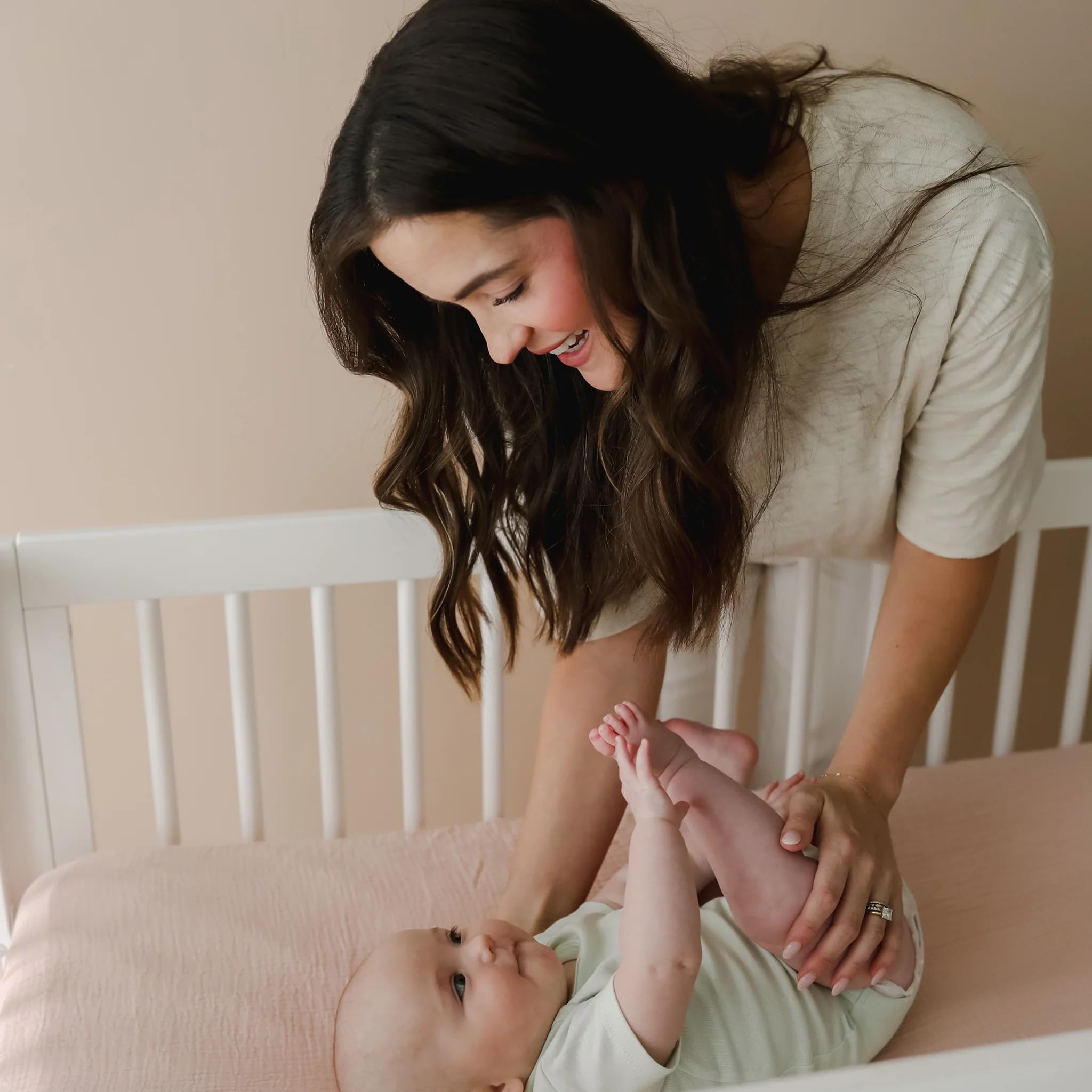Snuggle Me organic cotton crib sheet 2-pack breathable muslin texture on baby-safe surface