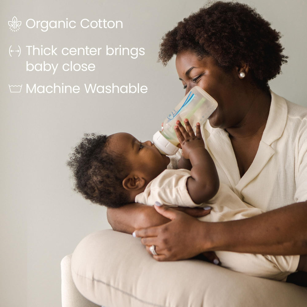 Snuggle Me Organic Nursing Pillow V2 baby nursing position demonstrates proper feeding alignment.