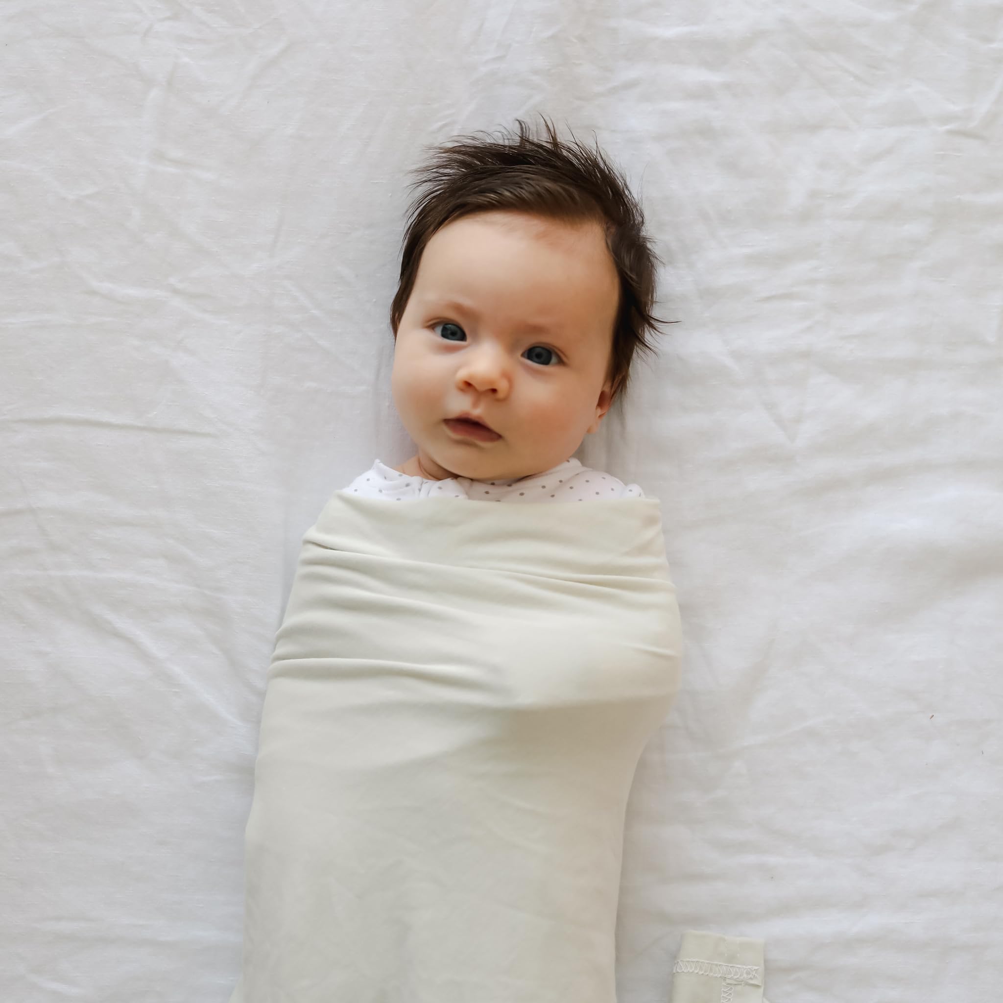 Snuggle Me Swaddle Sage wrap demonstration for easy baby wrapping.