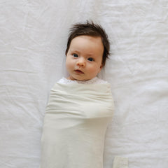 Snuggle Me Swaddle Sage wrap demonstration for easy baby wrapping.