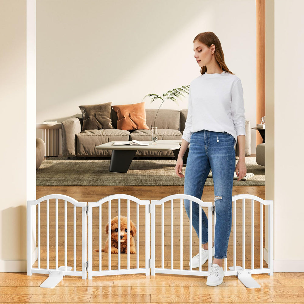 Snughome dog gate indoor-setup demonstrates easy freestanding installation for doorway containment.