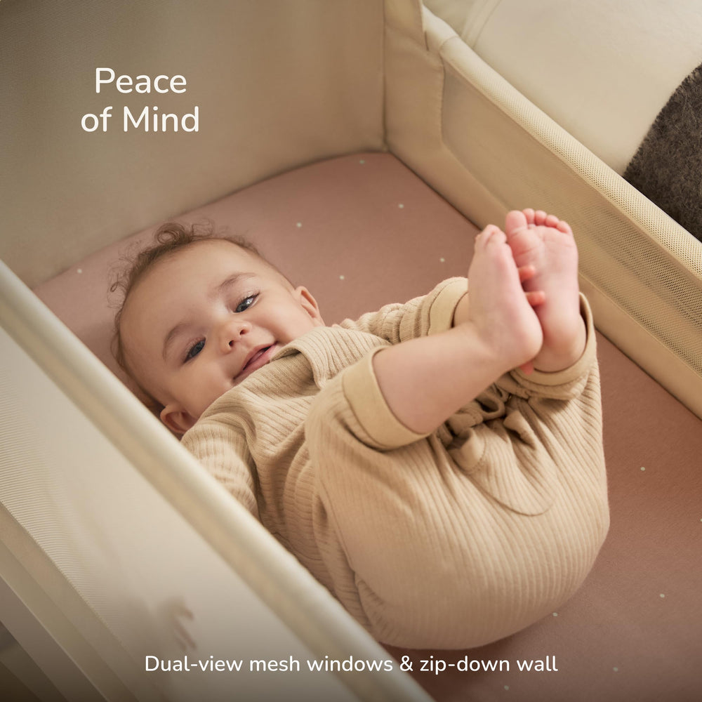 SnuzPod5 wooden frame complements modern nurseries with sturdy design.