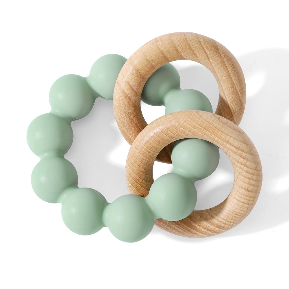 Socub Cambridge Blue teether closeup shows textured silicone beads for soothing gums.
