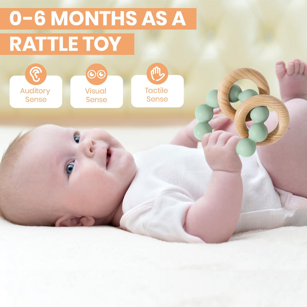 Socub Cambridge Blue teether ring with beech wood highlights tactile stimulation and safe chewing.