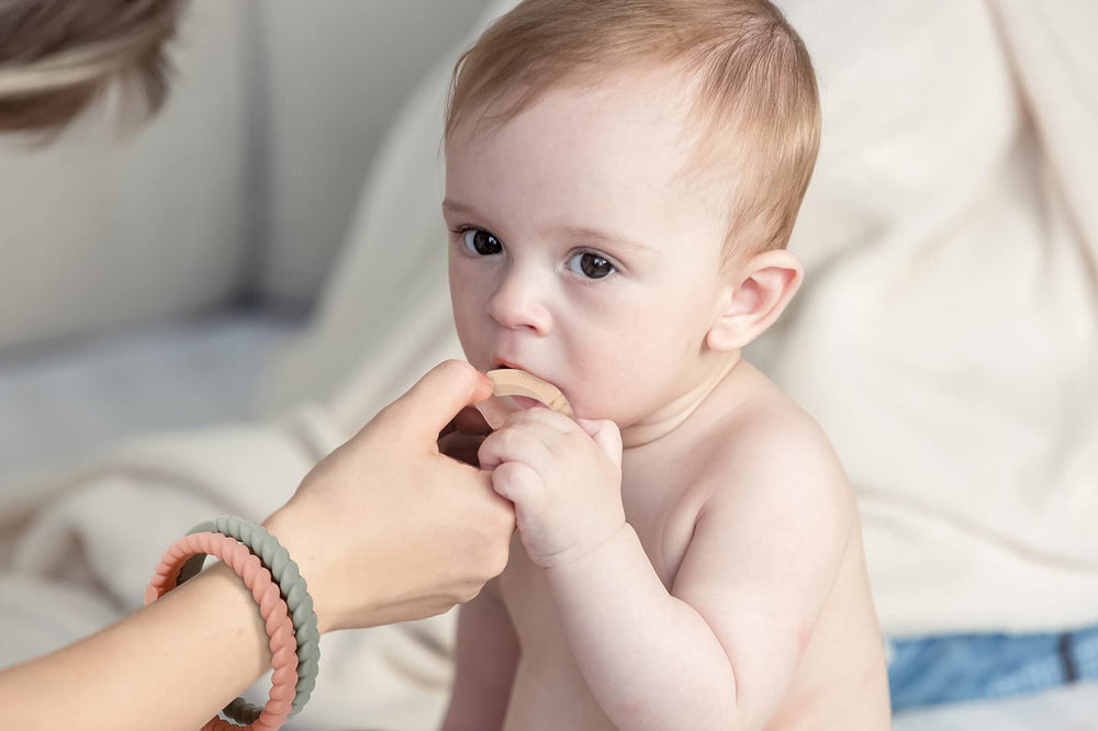 Socub teether bracelet Sage pairs with paci clips for within-reach calming.