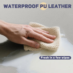 Sofoliana vegan leather baby play mat wipe-clean demo demonstrating easy spill cleanup