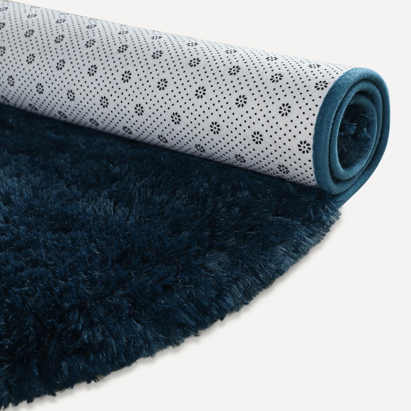 Softlife fluffy rug anti-slip bottom – stays put on smooth floors for safety.