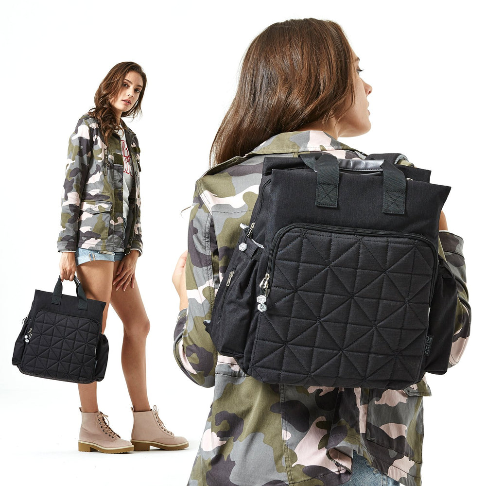 SoHo Designs Kenneth diaper backpack on stroller demonstrates hands-free convenience.