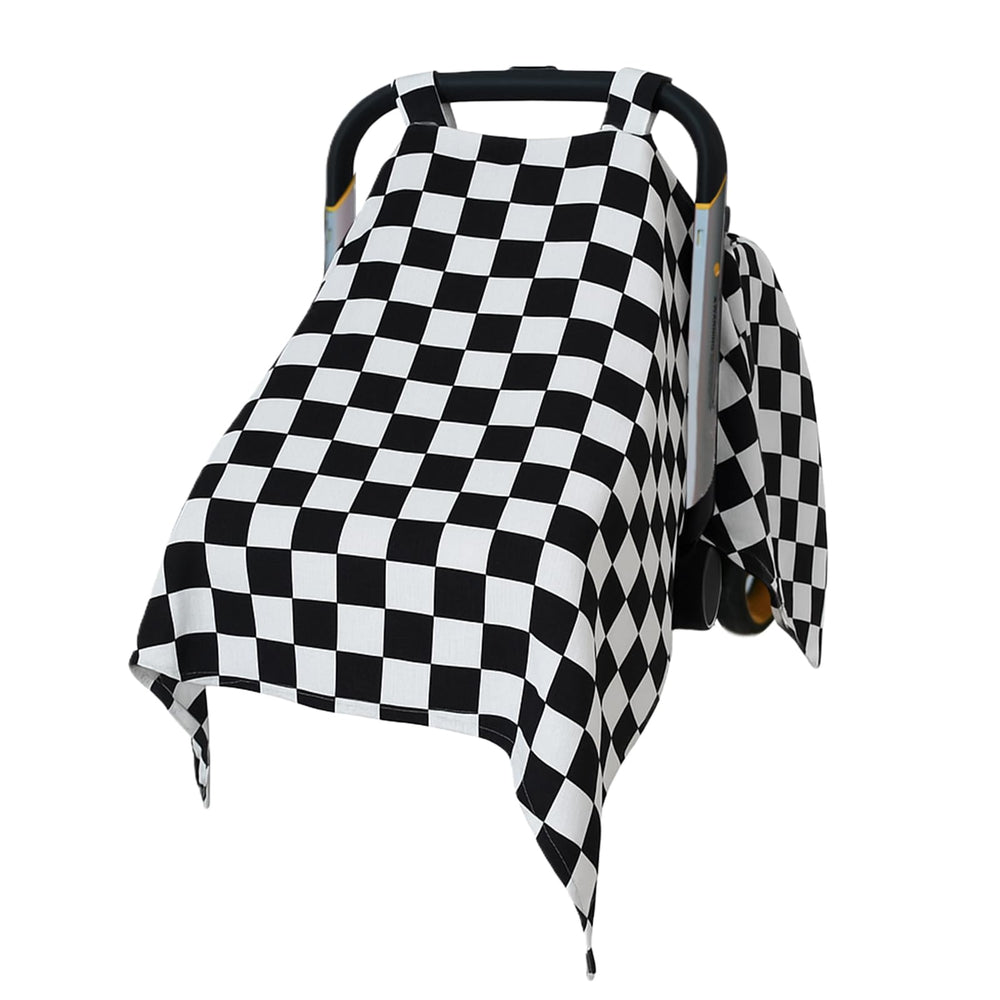 solTourne muslin car seat cover in black and white plaid provides 360° shade for baby.