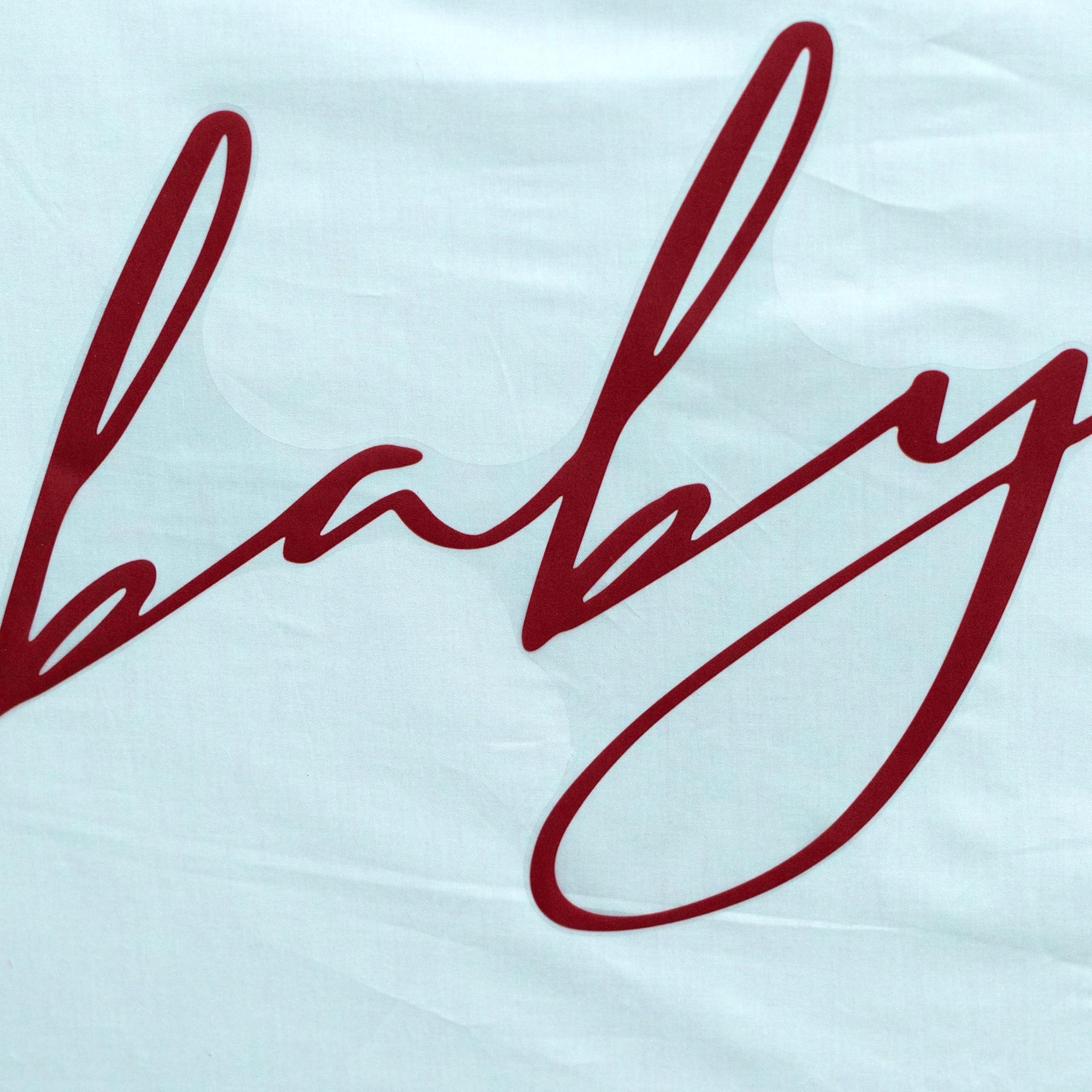 SOLUXIKA Santa Baby decal features burgundy text for a sophisticated Christmas look.