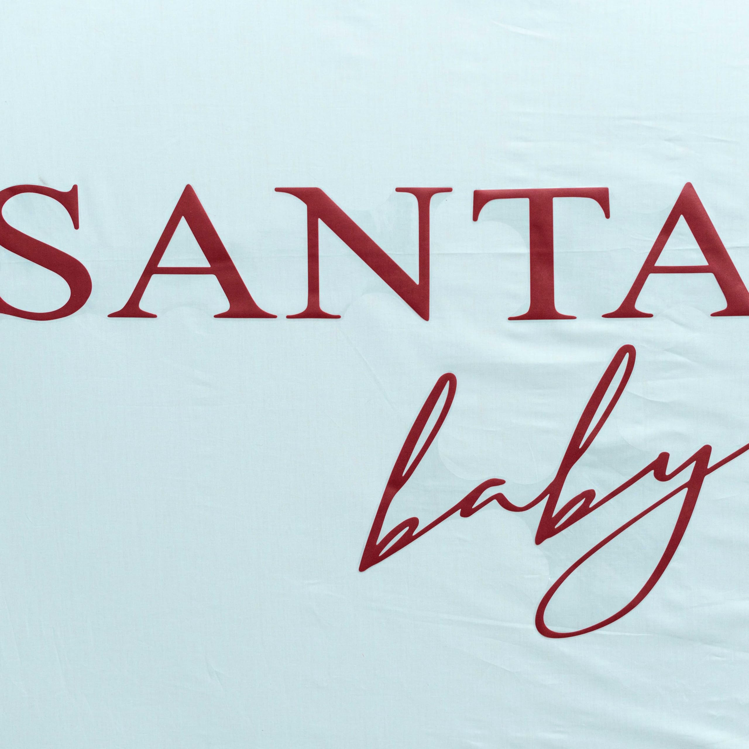 SOLUXIKA Santa Baby decal details emphasize festive motif for photos and party spaces.