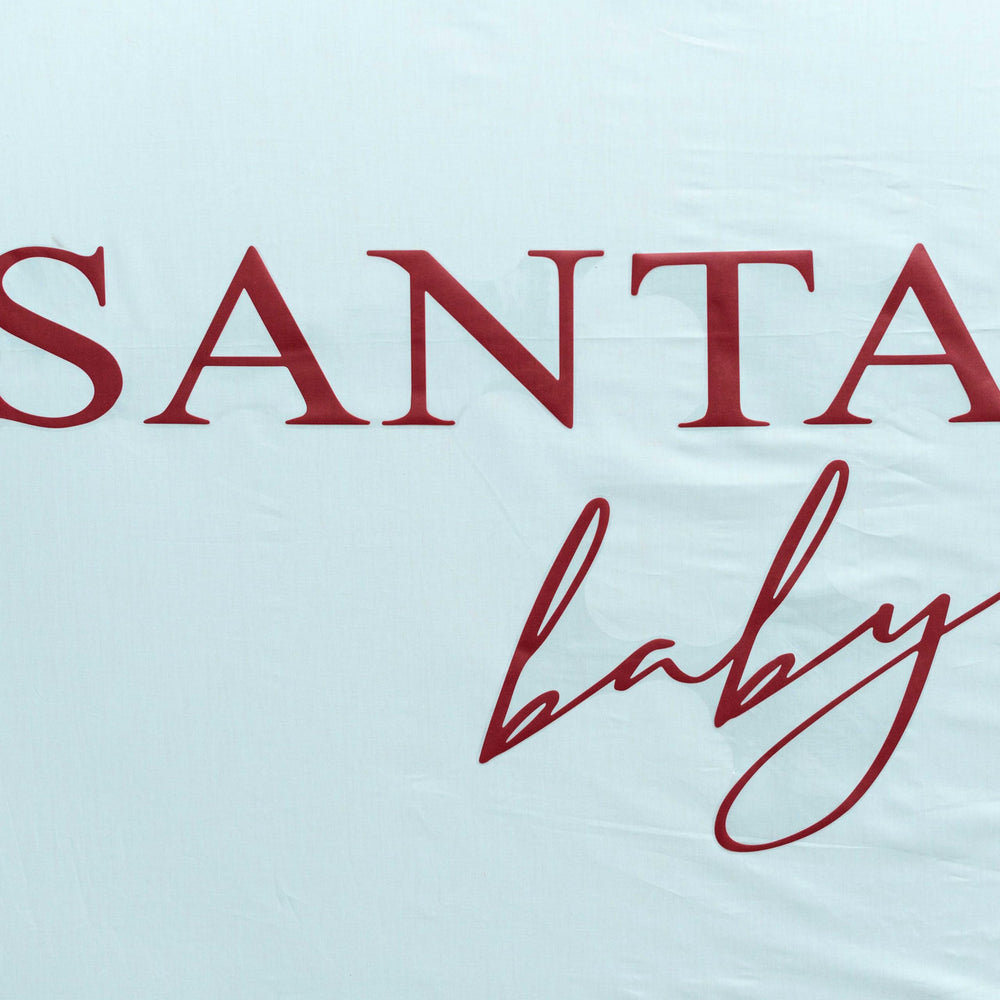 SOLUXIKA Santa Baby decal details emphasize festive motif for photos and party spaces.