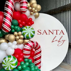 SOLUXIKA Santa Baby decal on wall creates a festive backdrop for holiday gatherings.