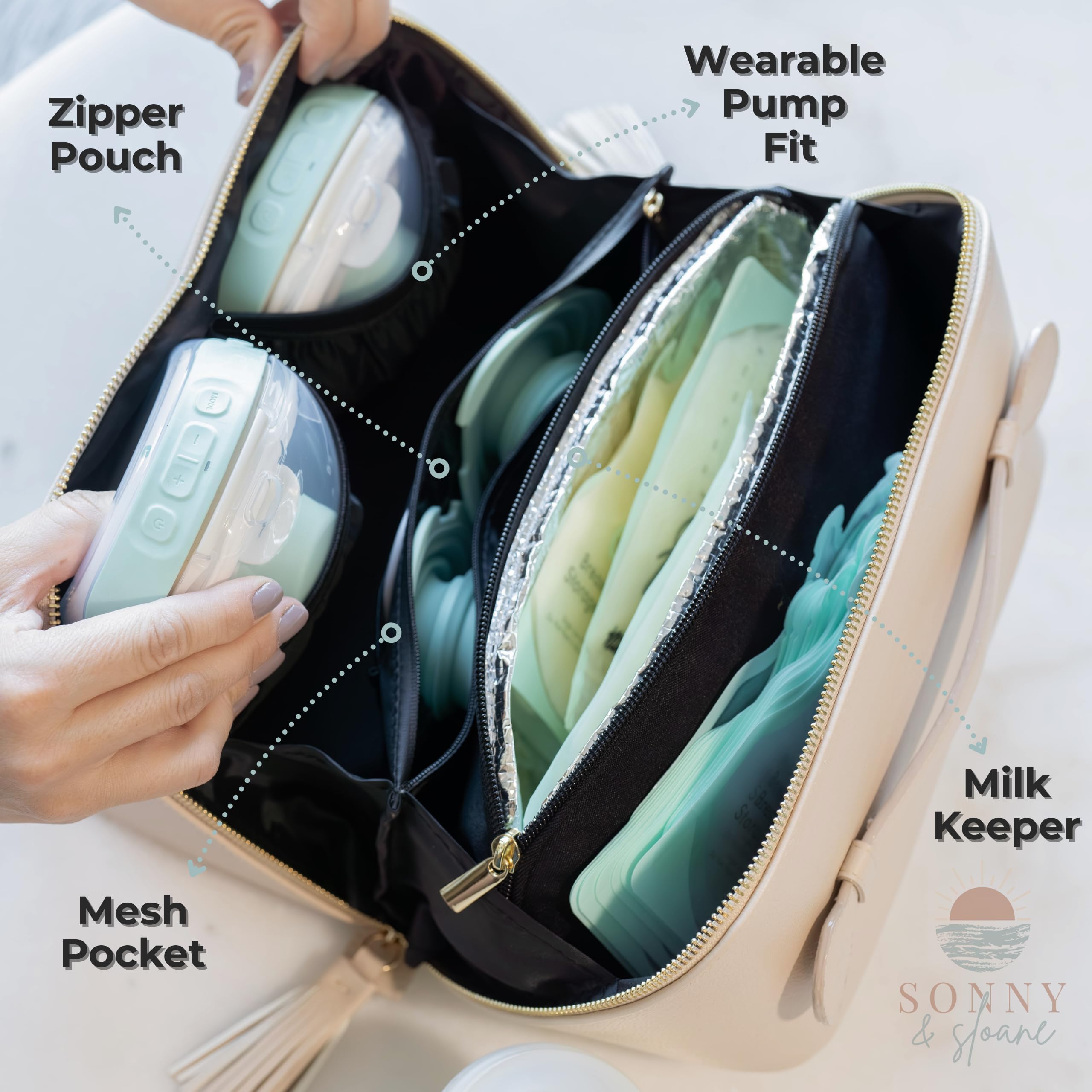 Sonny & Sloane bag cooler compartment open, keeping milk cool on the go.