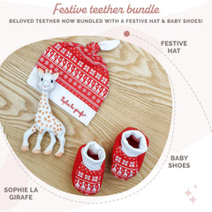 Sophie la girafe Christmas cap worn by baby for winter warmth.