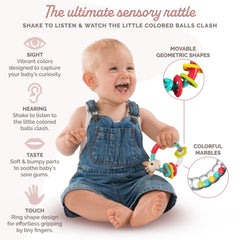 Sophie la girafe Multi-Textured Rattle chew ring offers safe teething relief.