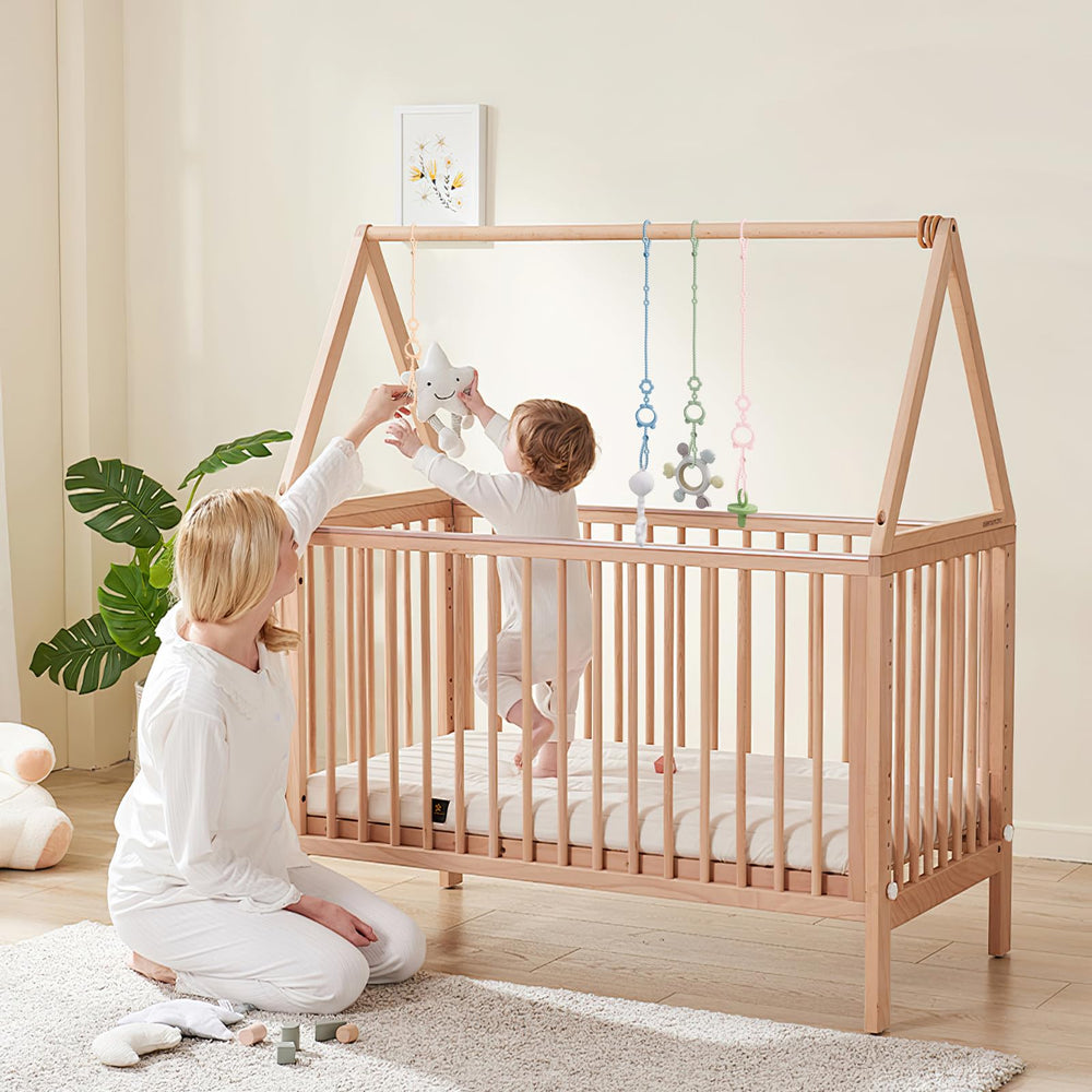 Sopkdey stroller toy strap set in three colors keeps baby items organized on outings.