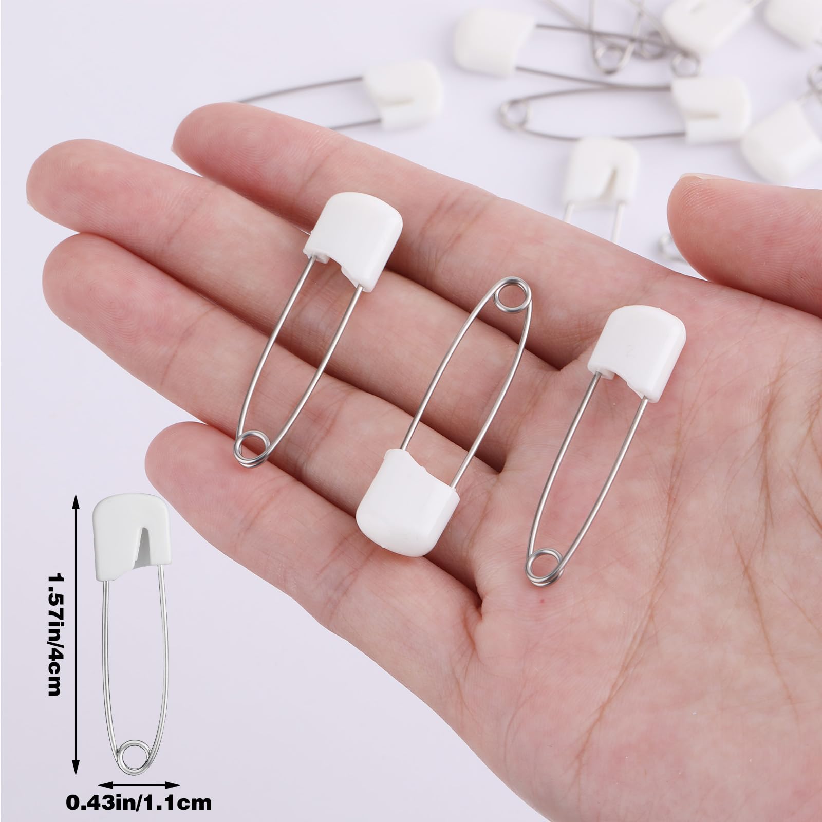 Sorcristy safety pins on quilt fabric illustrate multi-layer holding for sewing projects