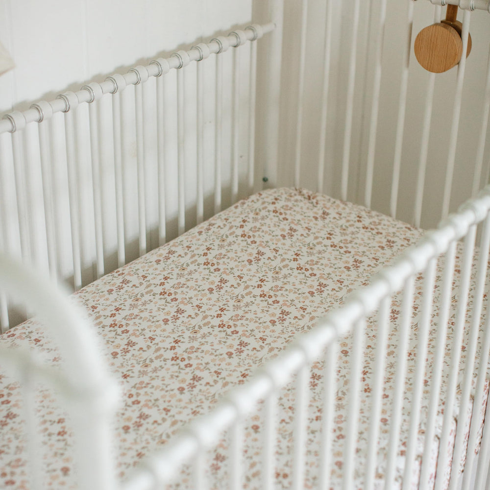 Sorrel + Fern mom-designed crib sheets reflect thoughtful nursery details.