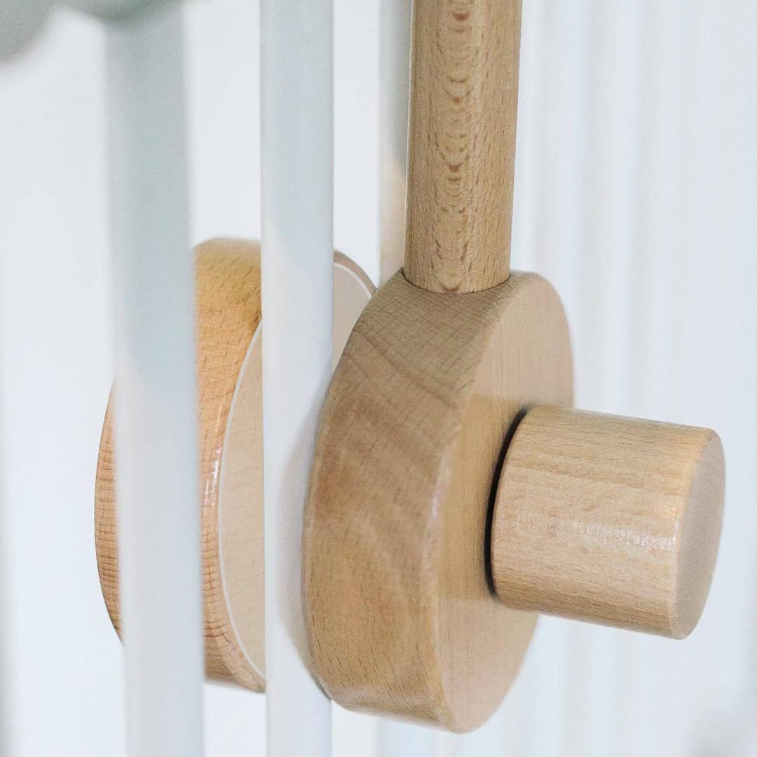 Sorrel + Fern anti-slip pads protect crib finish while securing the hanger.