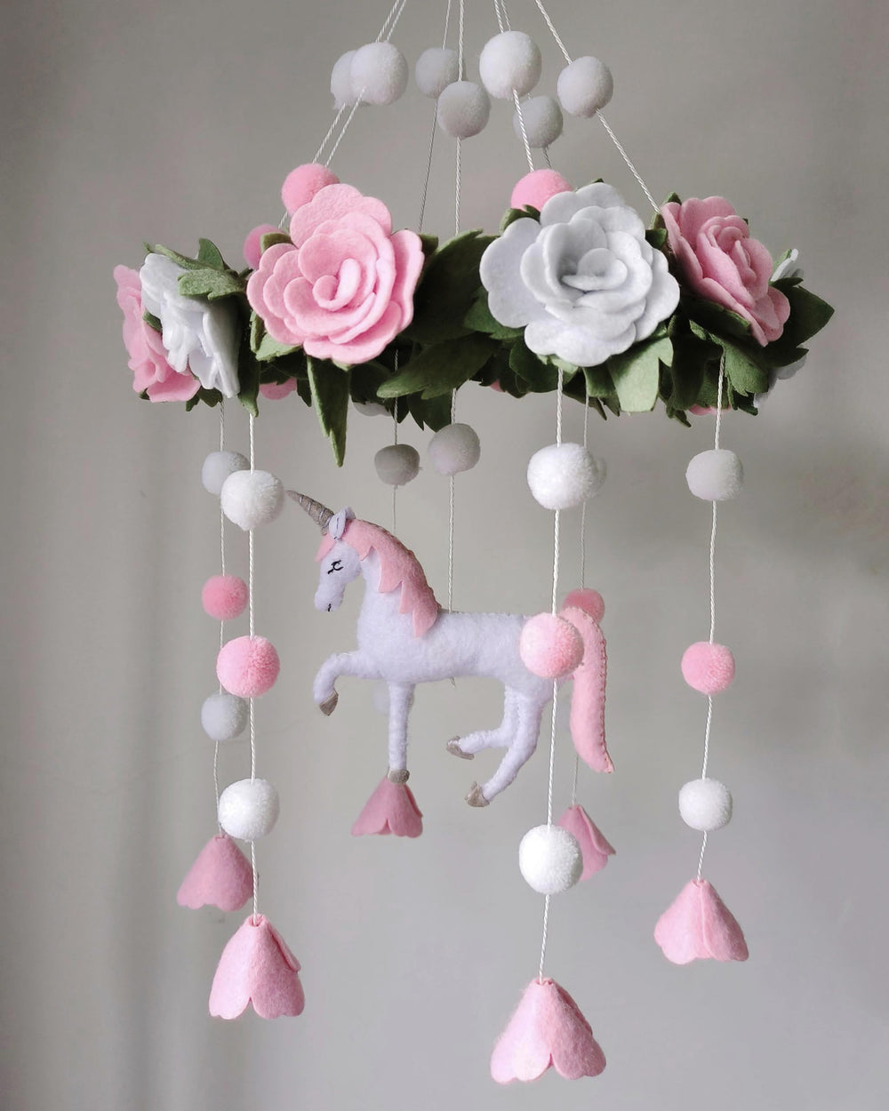 Sorrel + Fern Unicorn Blossom mobile uses unfinished beech wood for rustic nursery charm.