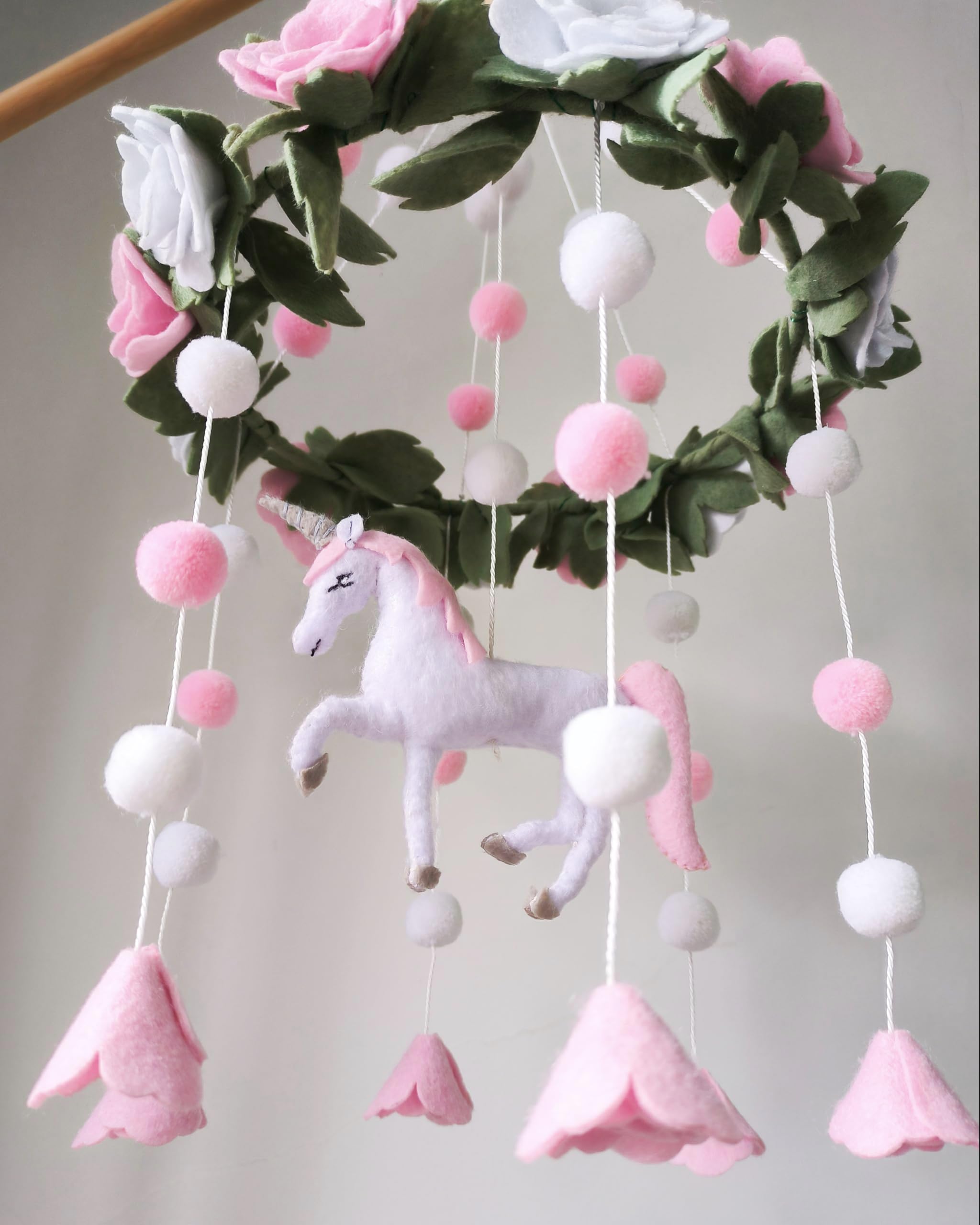 Sorrel + Fern Unicorn Blossom mobile presented as a thoughtful gift for baby showers and birthdays.