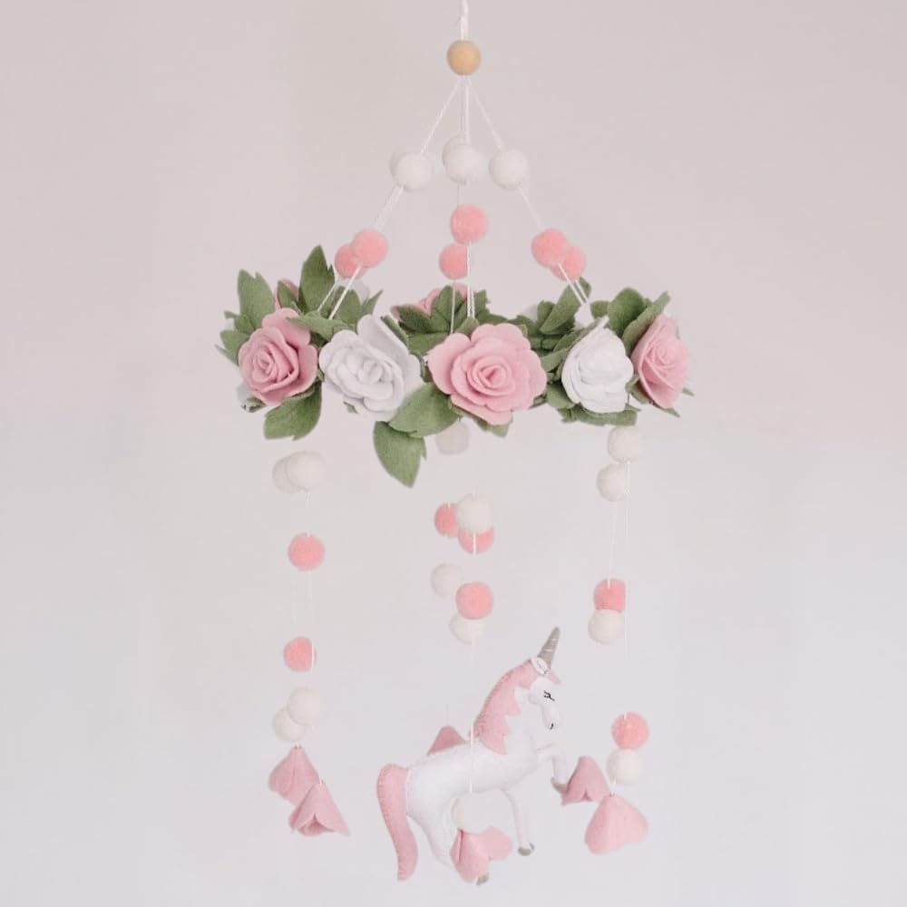 Sorrel + Fern Unicorn Blossom crib mobile with unicorn and floral accents for soothing nap time.