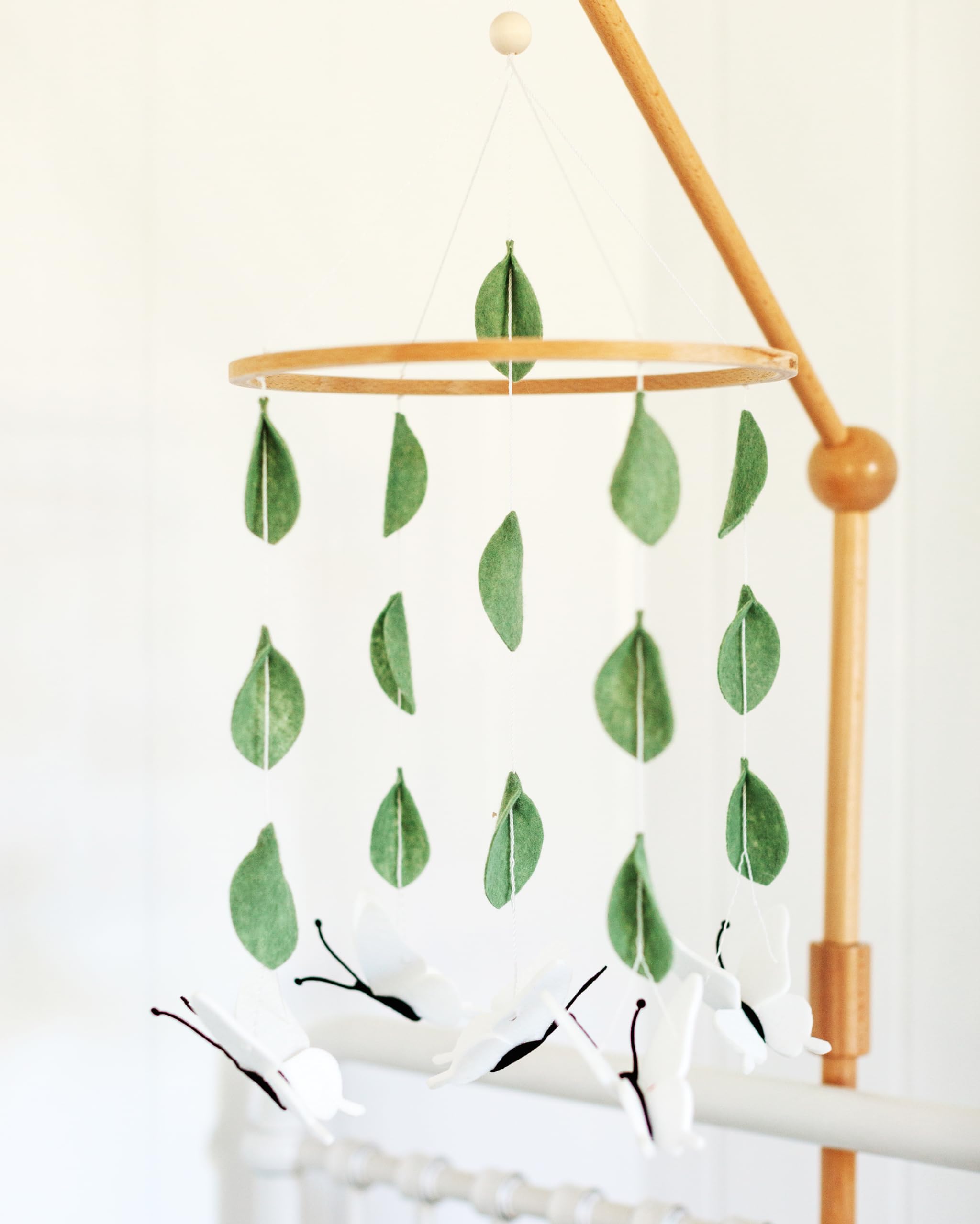 Sorrel + Fern bassinet-compatible mobile adds delicate decoration for early days