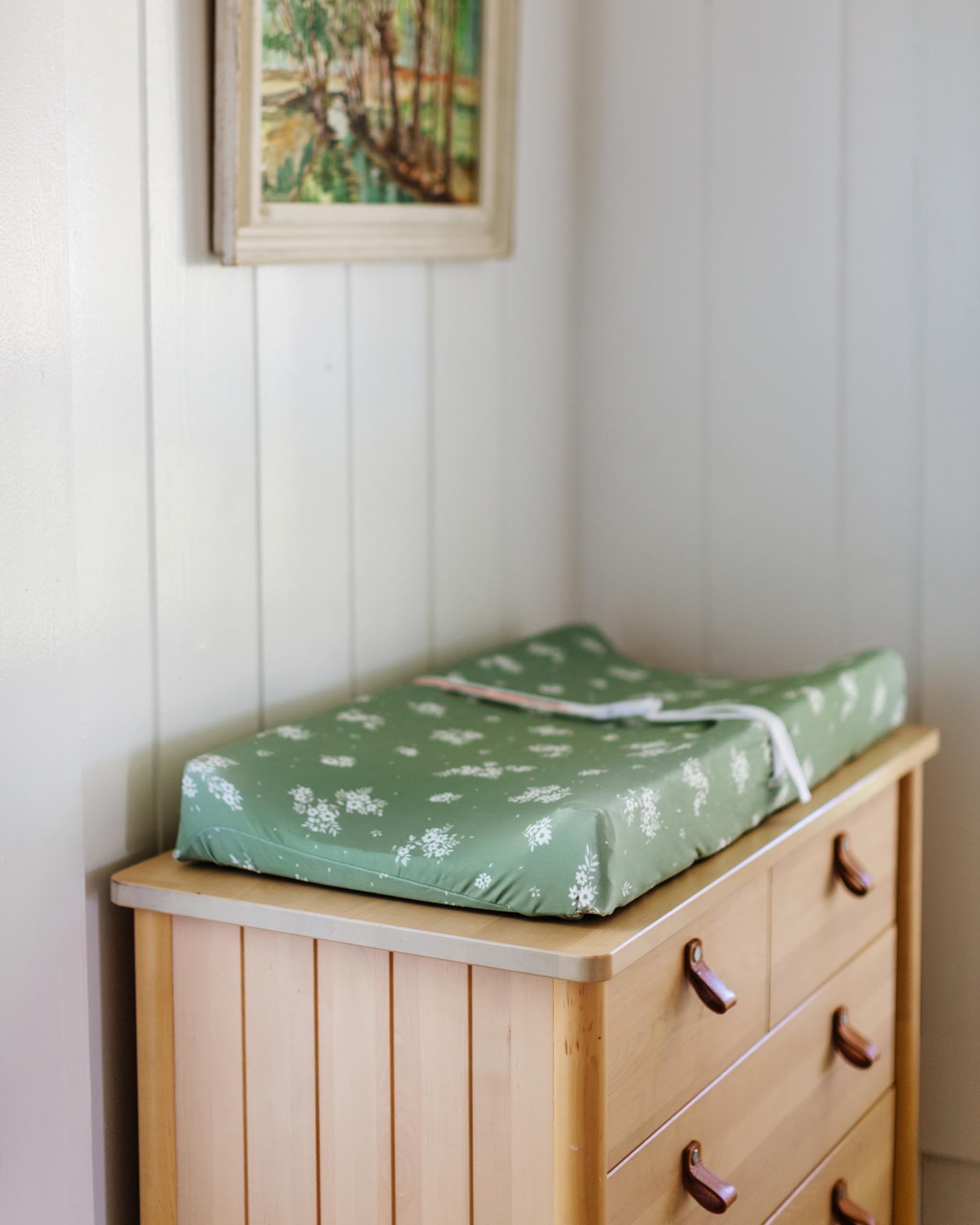 Butterfly Garden fitted cover on changing pad highlights deep pockets and snug fit.