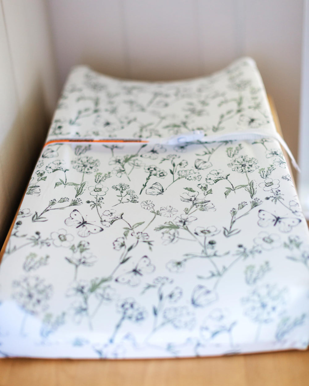 Coordinated mattress sheets with Butterfly Garden design to complete the nursery set.