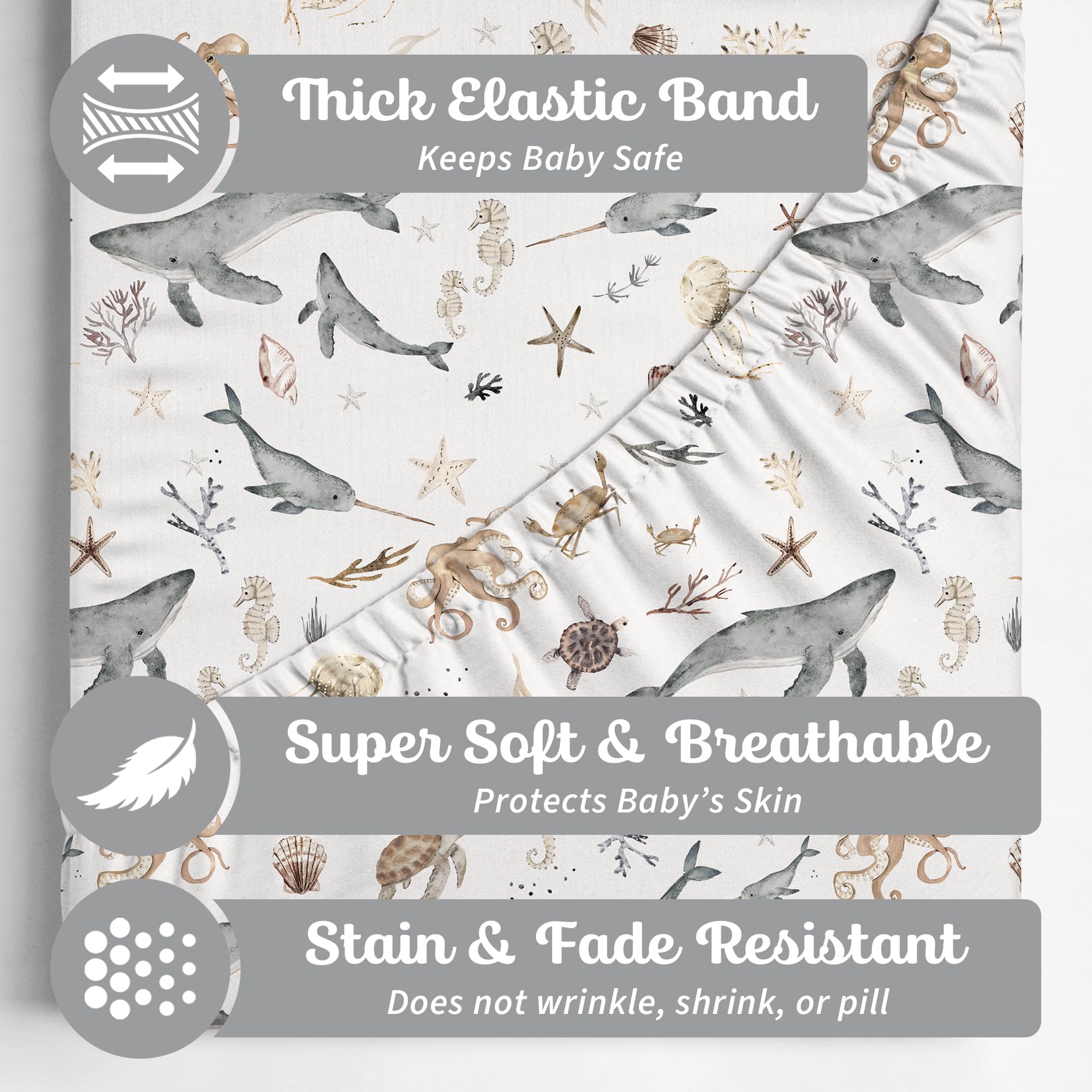 Sorrel + Fern crib sheets closeup emphasizes snug elastic and secure fit on standard mattresses