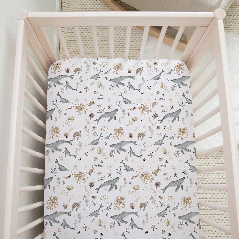 Sorrel + Fern two-pack crib sheets enabling easy mix-and-match with nursery decor