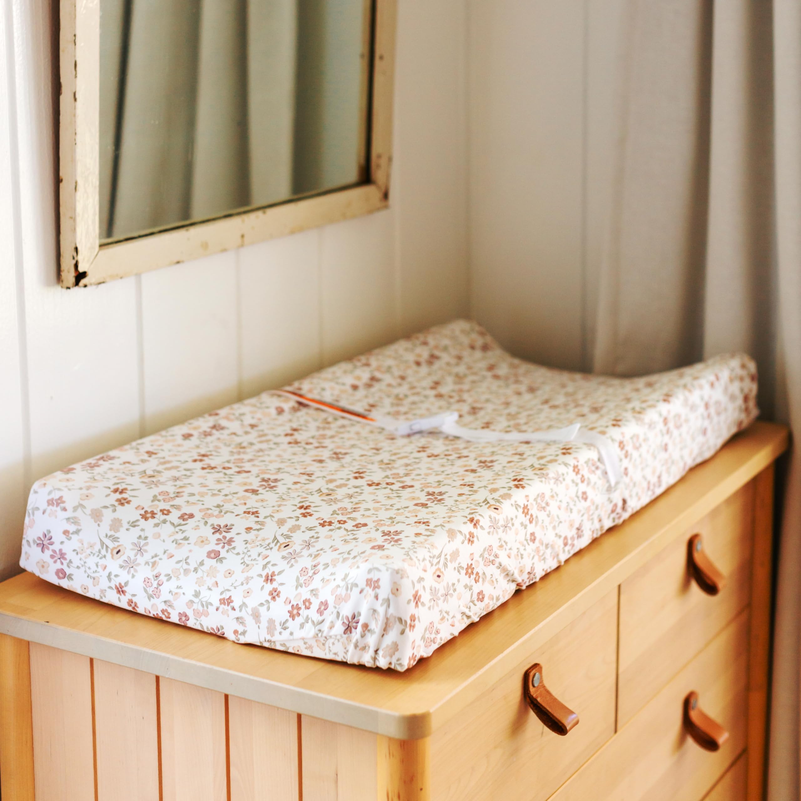Fleurette fabric texture detail on Sorrel + Fern cover, breathable and gentle.
