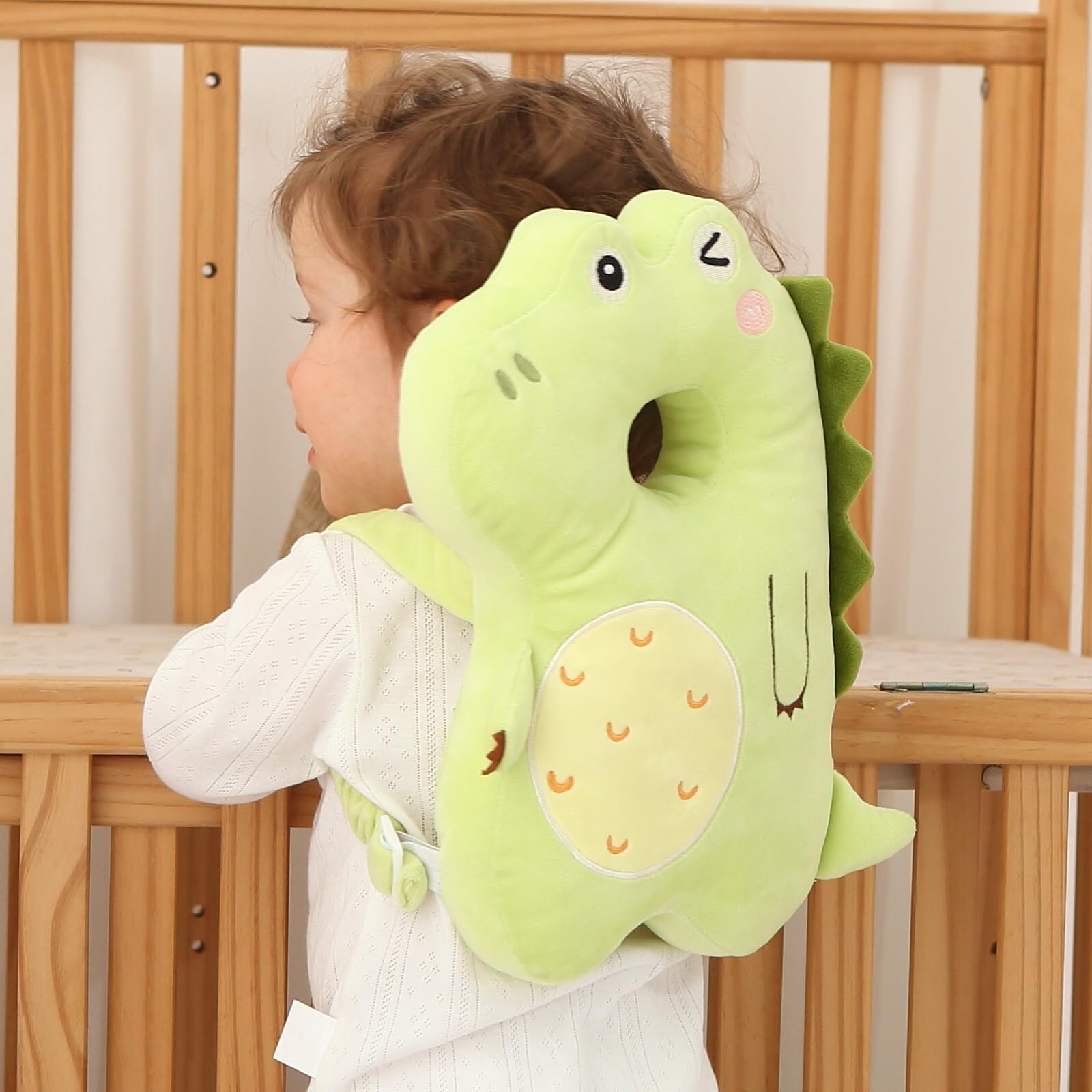 SOZOON baby head protector backpack with dinosaur design protects head while learning to walk.